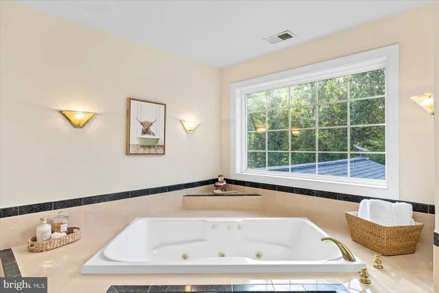 a view of storage and utility room with washer and dryer