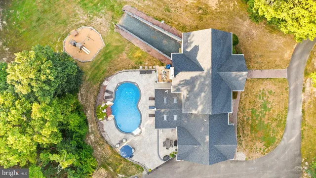 an empty room with entrance and windows