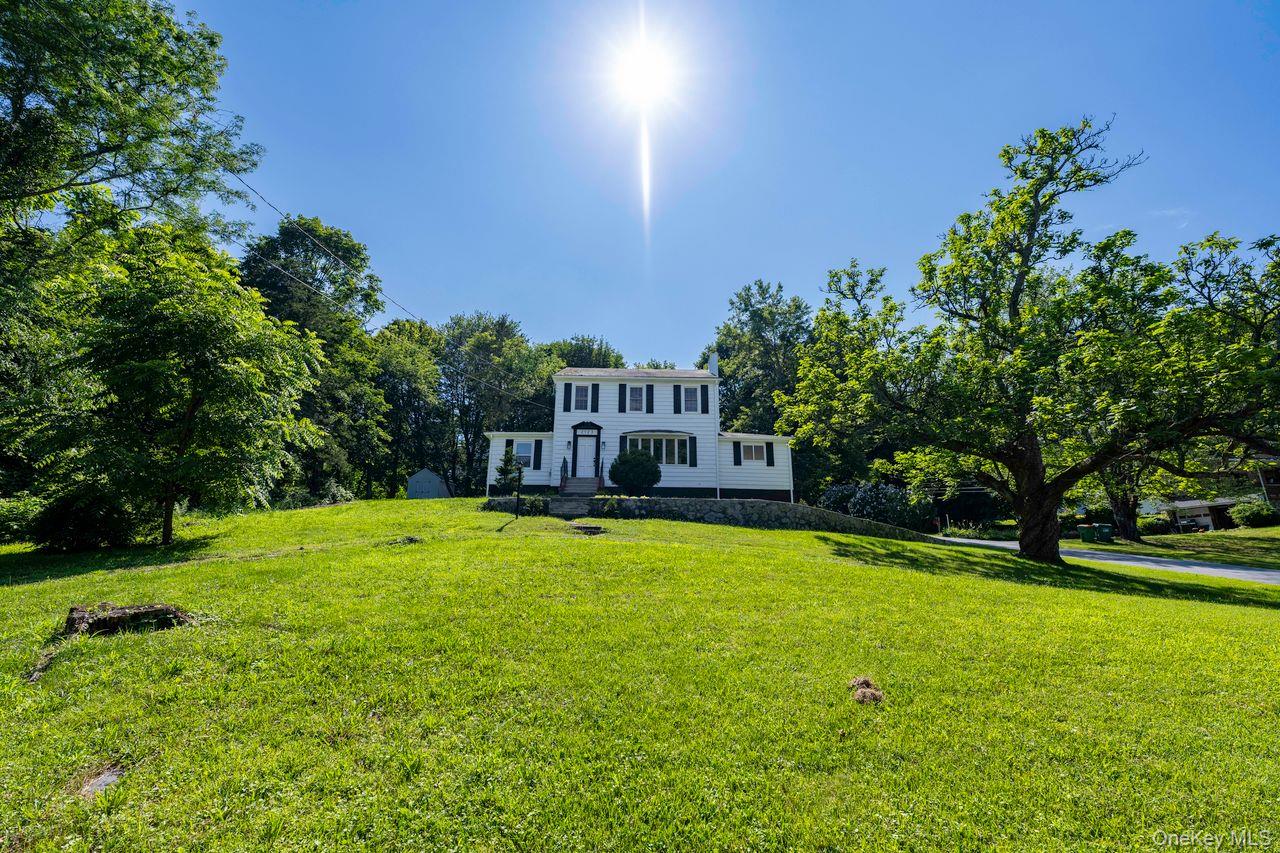 a house view with a garden space
