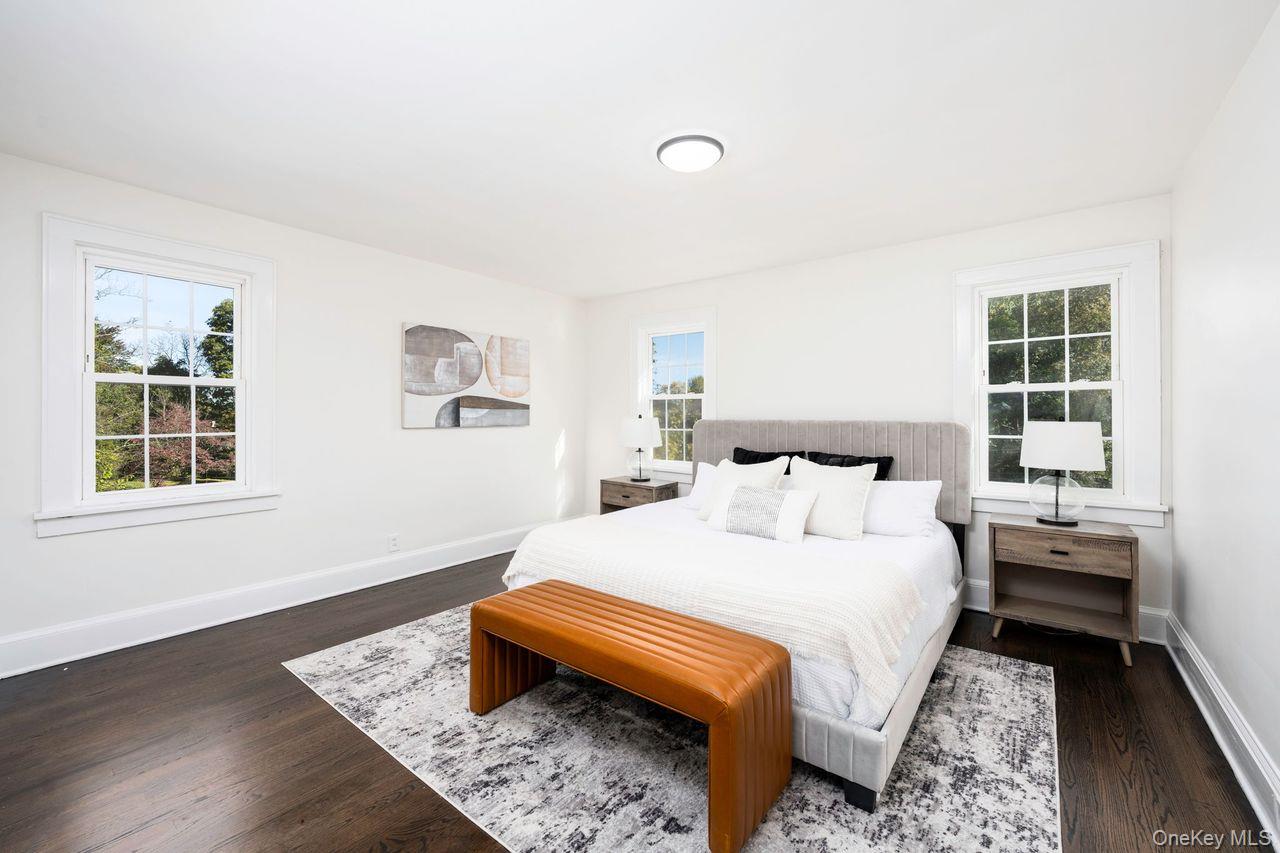 2123 New Hackensack Road Poughkeepsie, NY 12603 - Photo 17 of 30 a bedroom with a bed and wooden floor