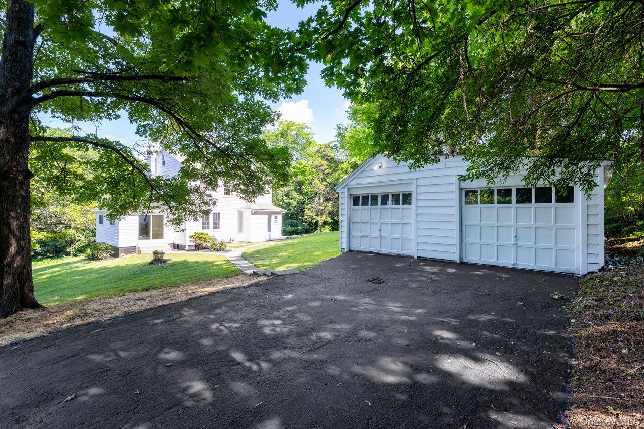 2123 New Hackensack Road Poughkeepsie, NY 12603 - Photo 24 of 30 a view of a house with a yard and tree s