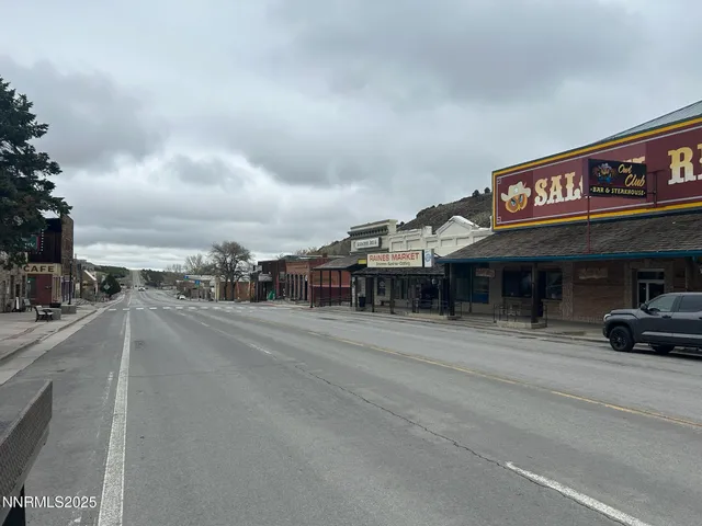 a view of a street with cars