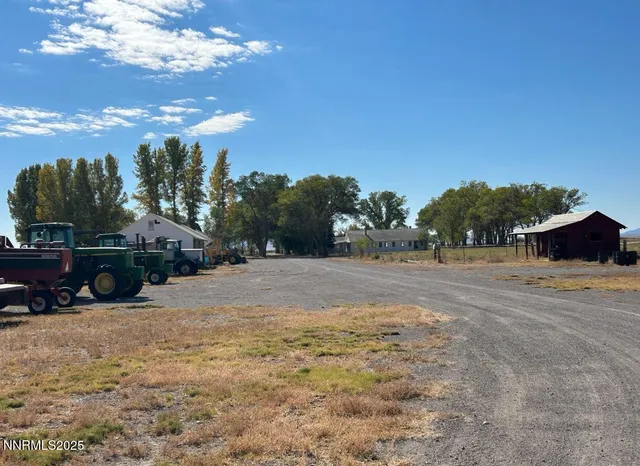 a view of a backyard of a house