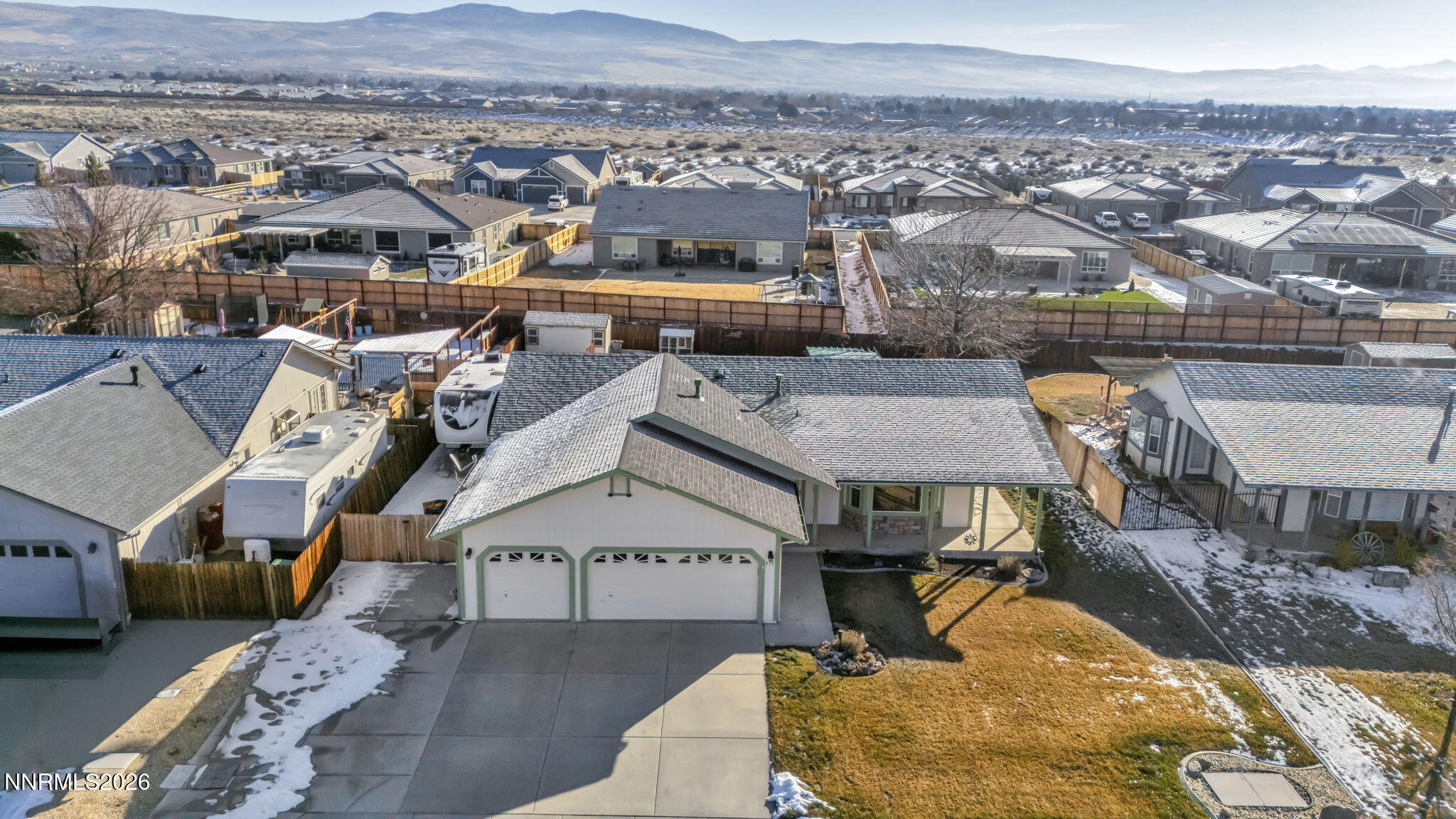 952 Red Falcon Way Spanish Springs, NV 89441 - Photo 40 of 46 an aerial view of a house with a mountain