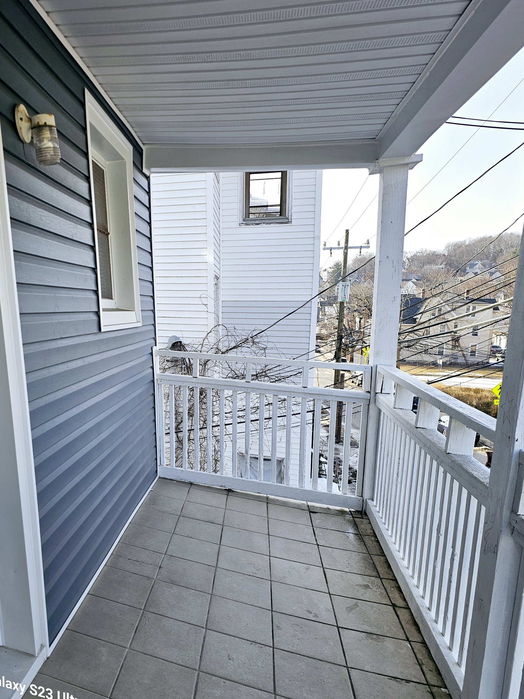 124 Division Street Waterbury, CT 06704 - Photo 12 of 12 a view of a porch with wooden floor