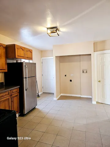 a view of a kitchen with a sink