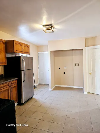 a view of a kitchen with a sink