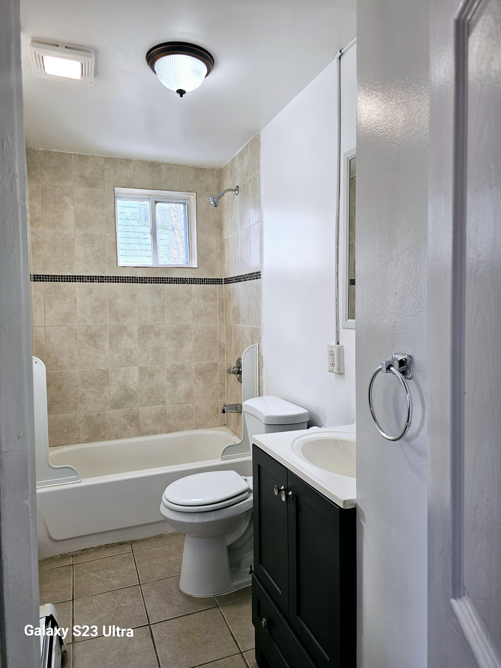 124 Division Street Waterbury, CT 06704 - Photo 7 of 12 a bathroom with a sink a toilet and shower