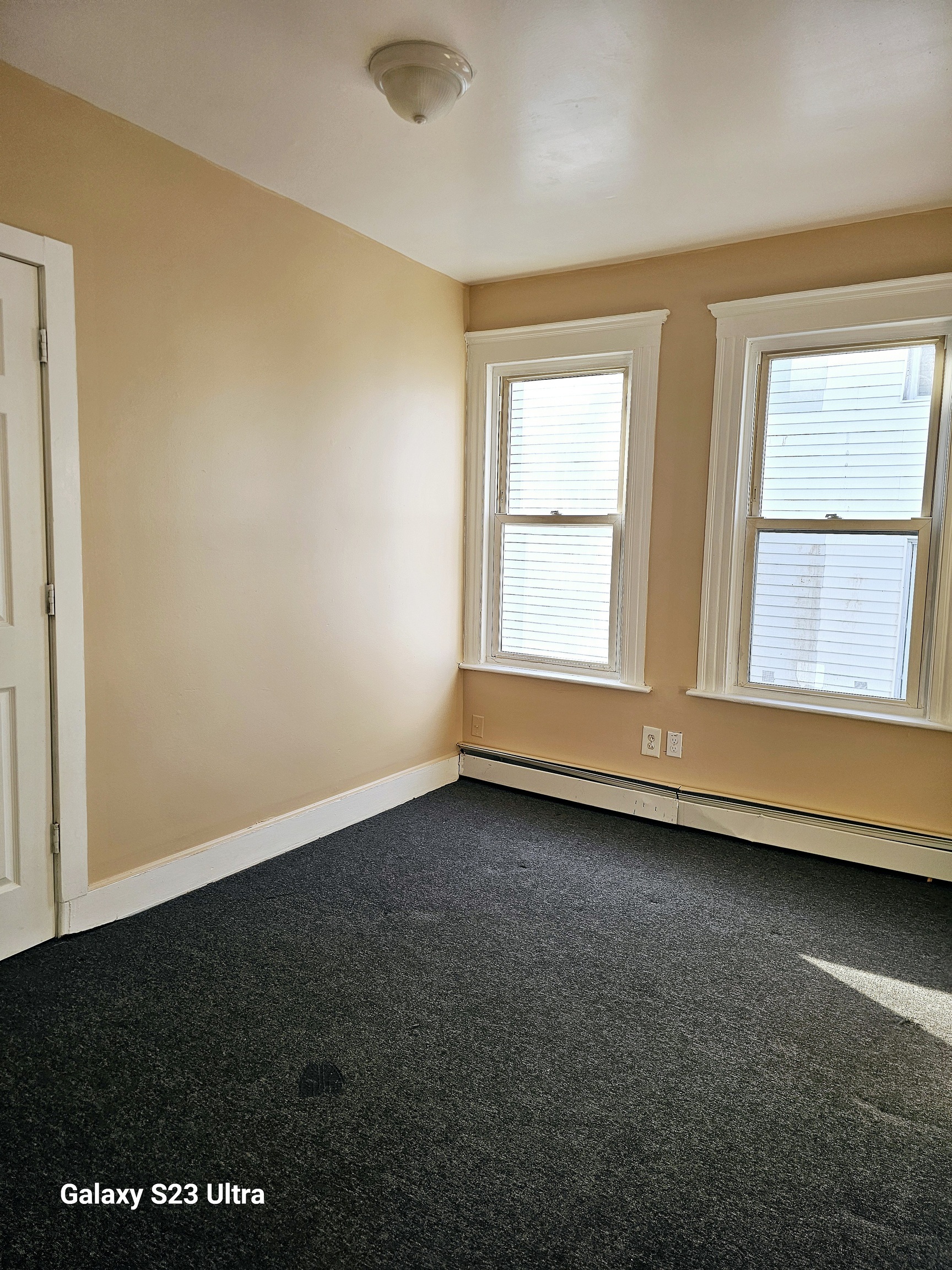 124 Division Street Waterbury, CT 06704 - Photo 9 of 12 an empty room with a window