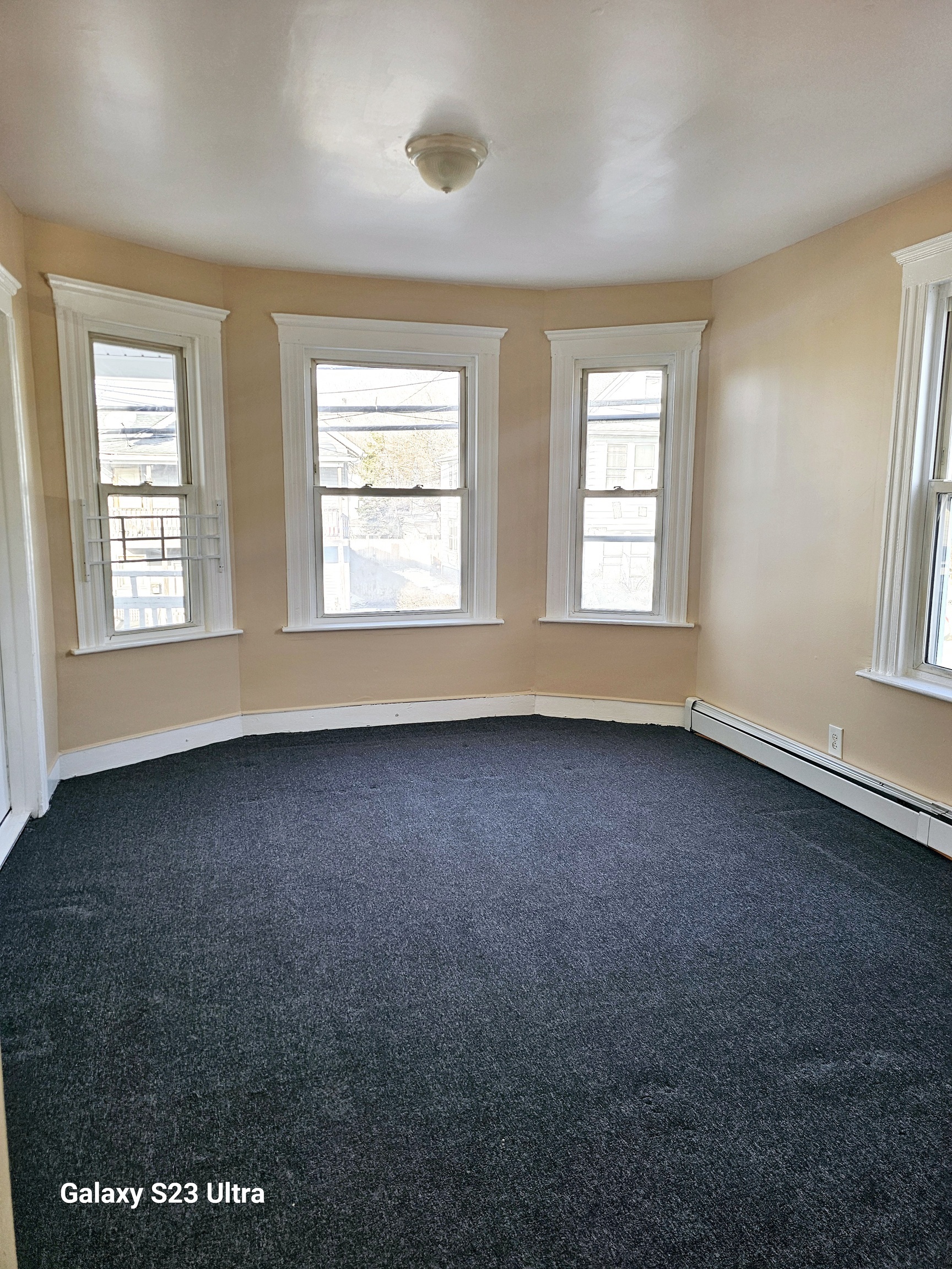 124 Division Street Waterbury, CT 06704 - Photo 10 of 12 an empty room with a window