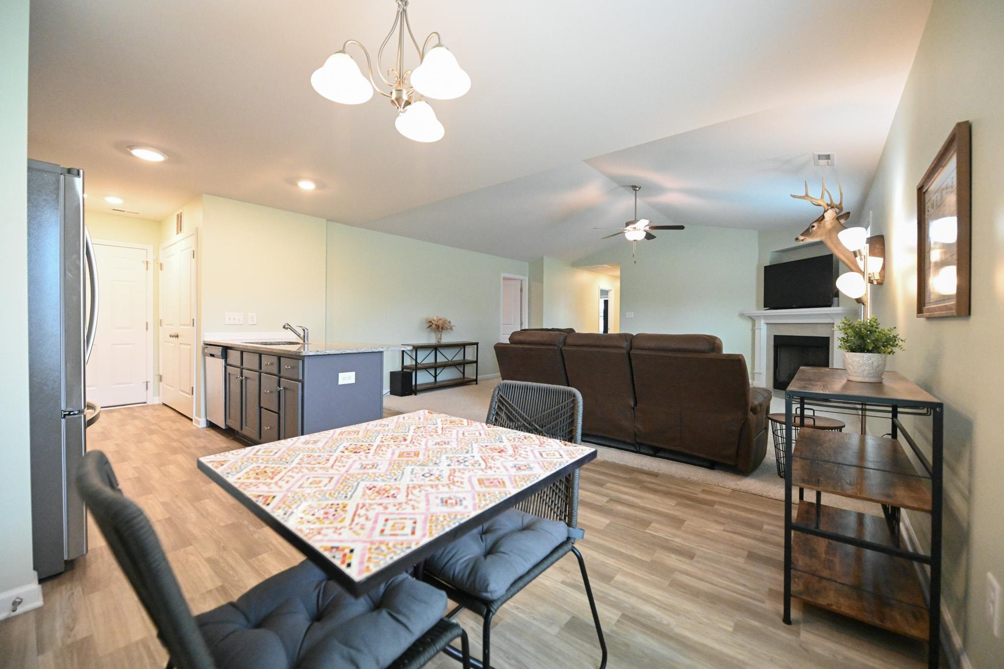 132 Winter Red Way Benson, NC 27504 - Photo 9 of 33 a view of a dining room with furniture and wooden floor