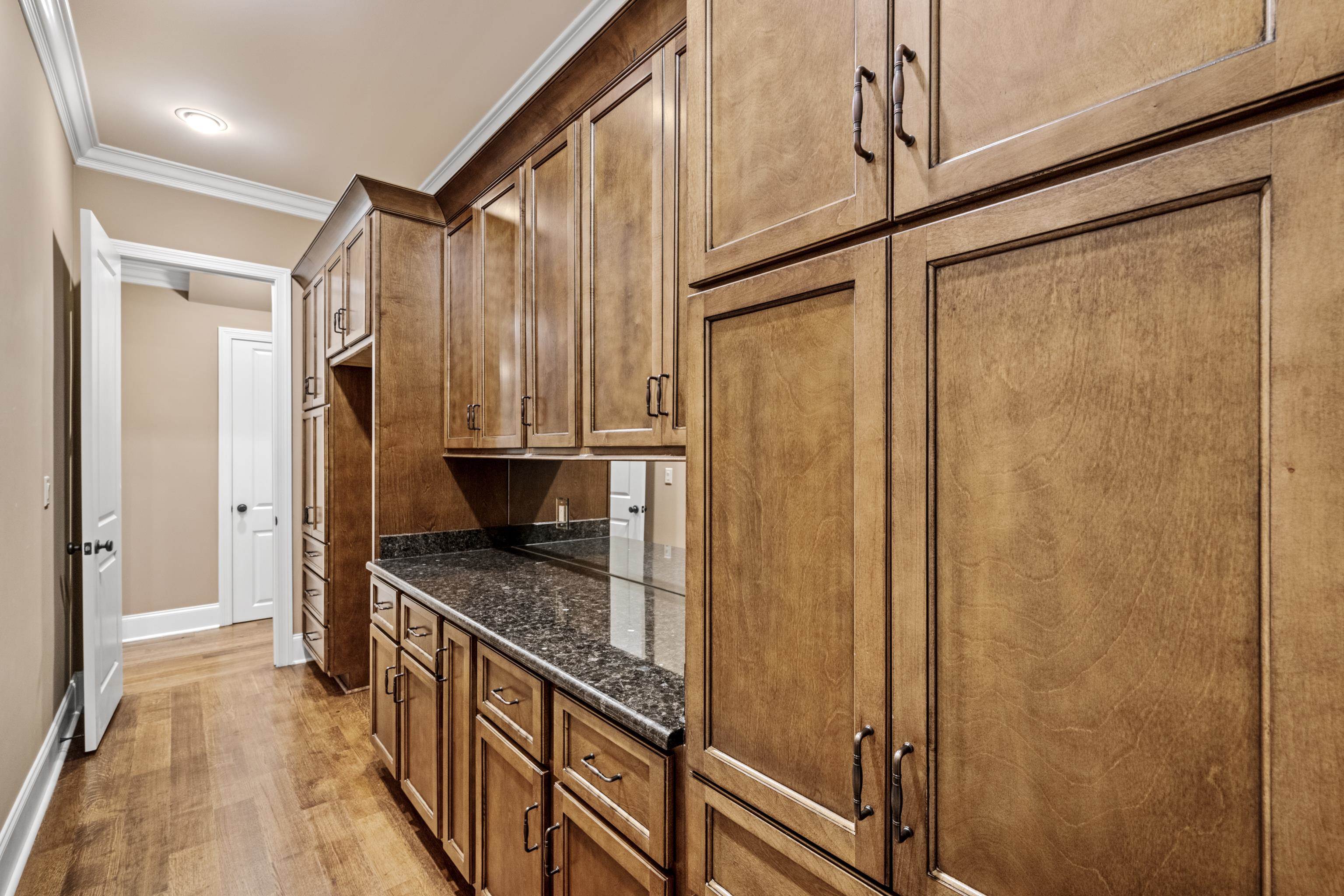 2840 Rue Jordan Cove Germantown, TN 38138 - Photo 16 of 40 a kitchen with stainless steel appliances granite countertop a refrigerator and a sink