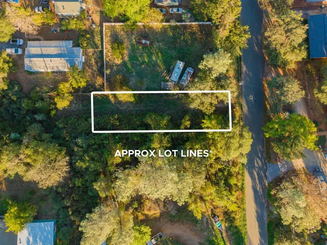 a view of a house with a garden