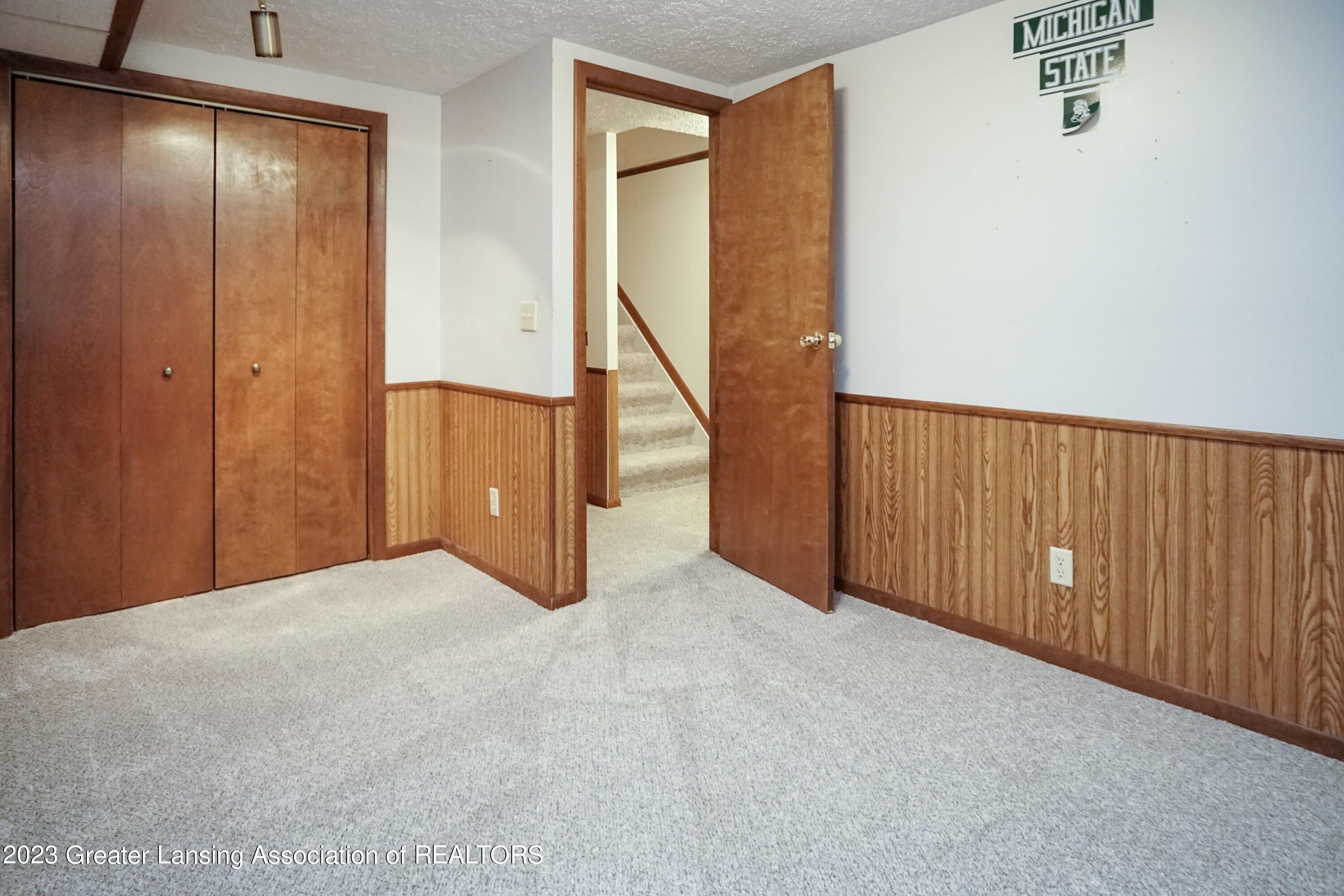 5872 Green Road Haslett, MI 48840 - Photo 24 of 31 Flex Rm Basement 2