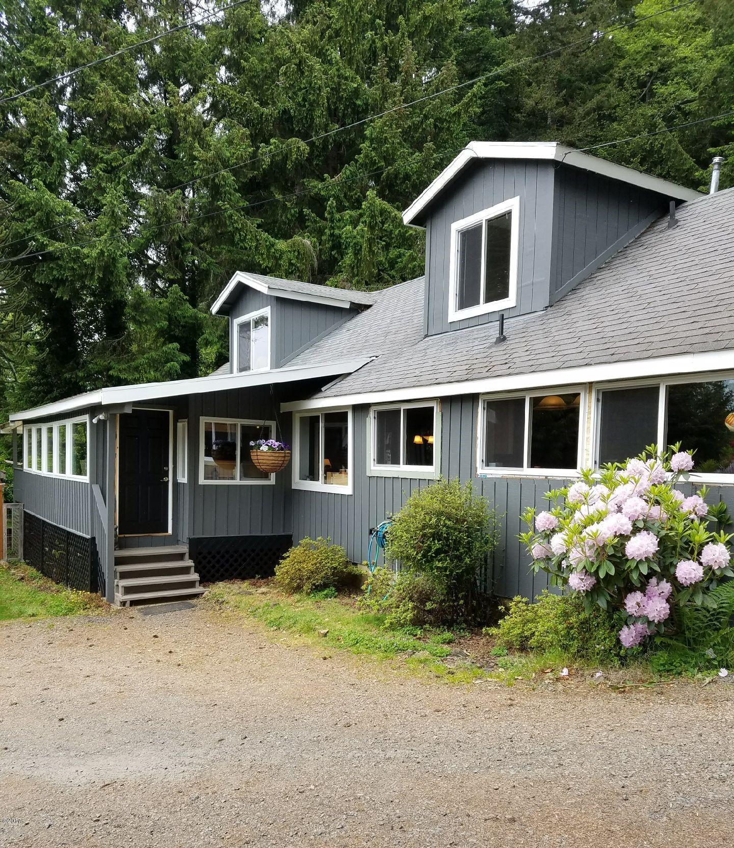 2970 Northeast East Devils Lake Road Otis, OR 97368 - Photo 2 of 12 Covered porch entry