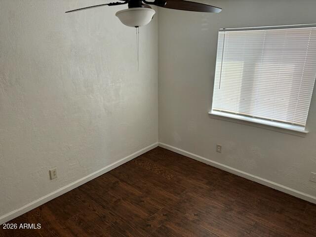 1319 West Vogel Avenue, Unit 3 Phoenix, AZ 85021 - Photo 5 of 5 a view of a small space with wooden floor and a window