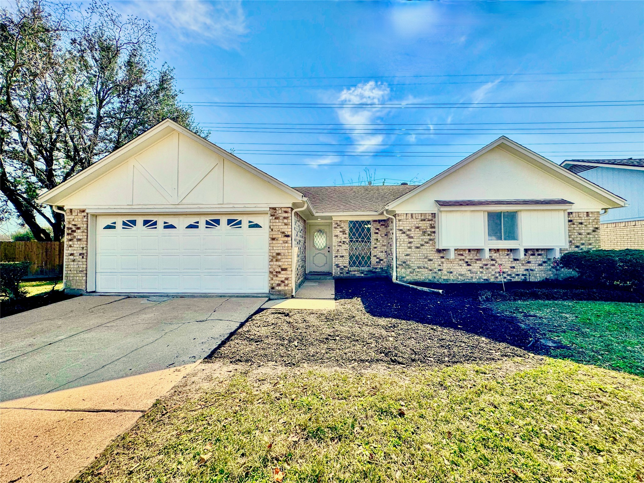 a front view of a house with yard