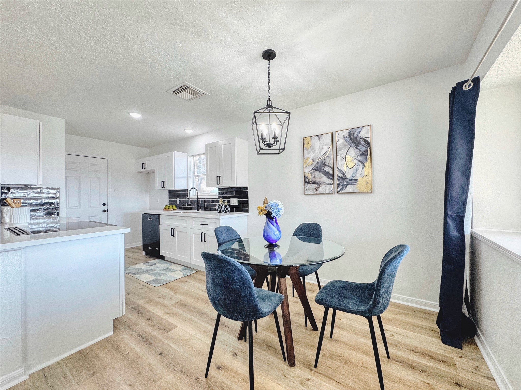 3739 Moonlite Drive Pasadena, TX 77505 - Photo 10 of 32 a view of a dining room with furniture and wooden floor