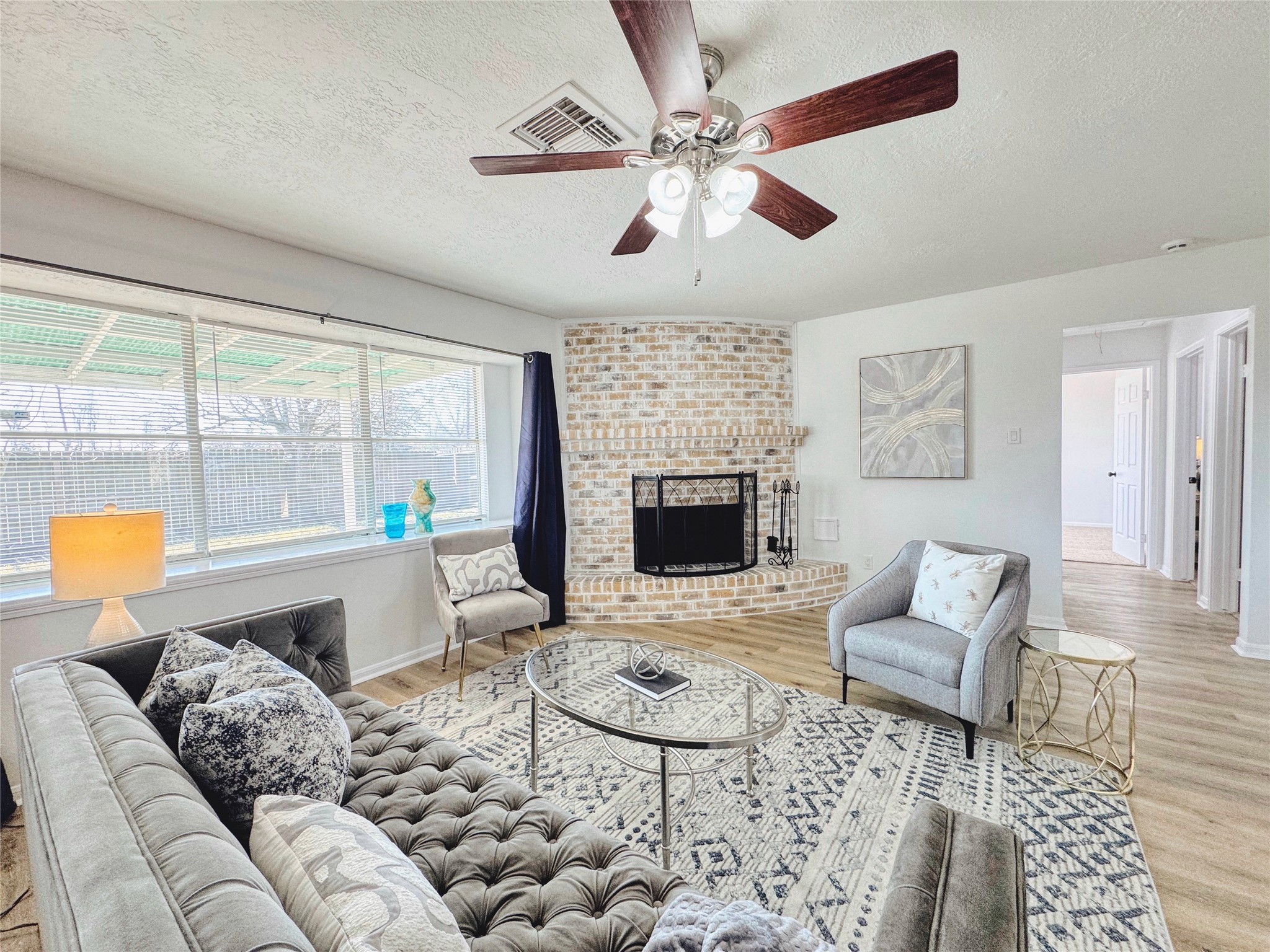 3739 Moonlite Drive Pasadena, TX 77505 - Photo 16 of 32 a living room with furniture and a fireplace