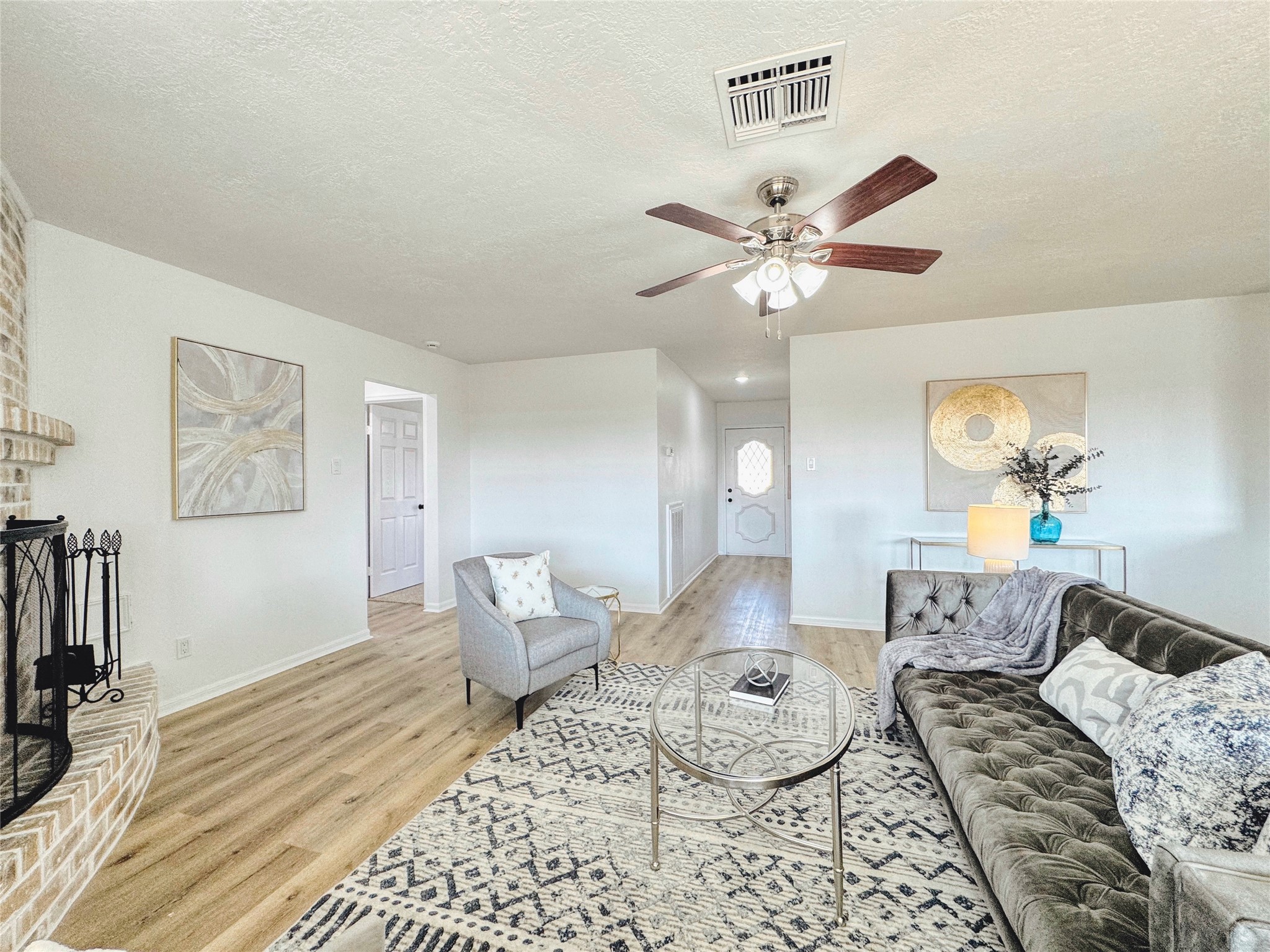 3739 Moonlite Drive Pasadena, TX 77505 - Photo 8 of 32 a living room with furniture and a chandelier