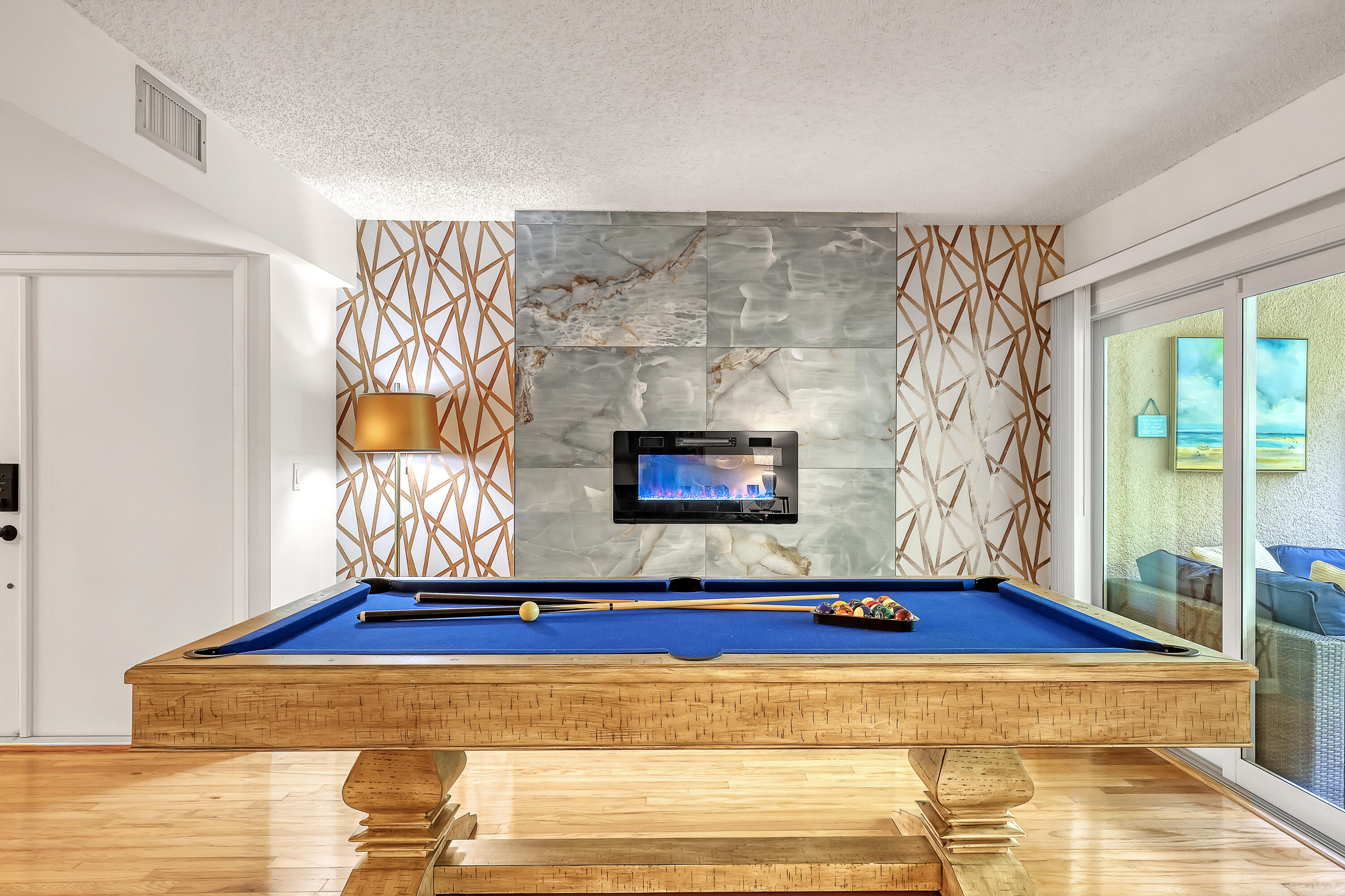 1100 Surf Road, Unit 104 West Palm Beach, FL 33404 - Photo 10 of 49 fireplace