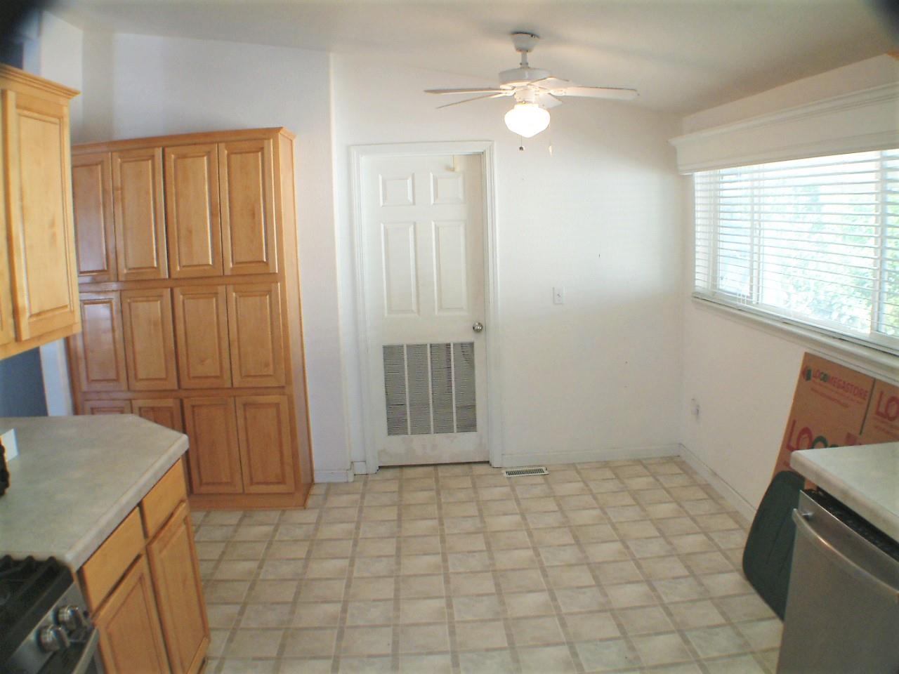 433 Sylvan Avenue, Unit 121 Mountain View, CA 94041 - Photo 5 of 18 a view of an empty room with window and cabinet