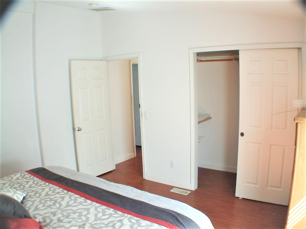433 Sylvan Avenue, Unit 121 Mountain View, CA 94041 - Photo 10 of 18 a bedroom with a bed and a rug