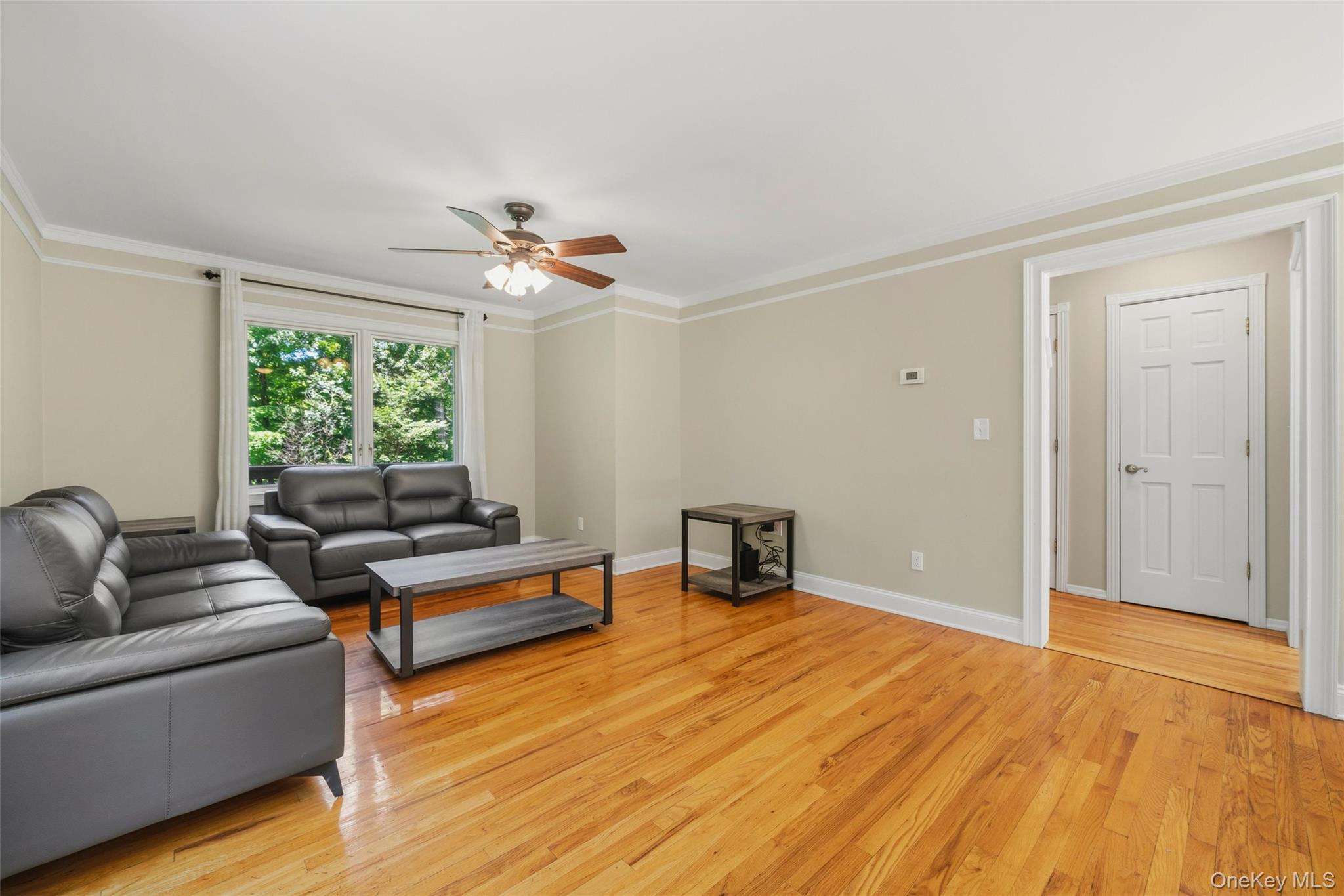 44 Sayer Road Blooming Grove, NY 10914 - Photo 21 of 39 a living room with furniture and a large window