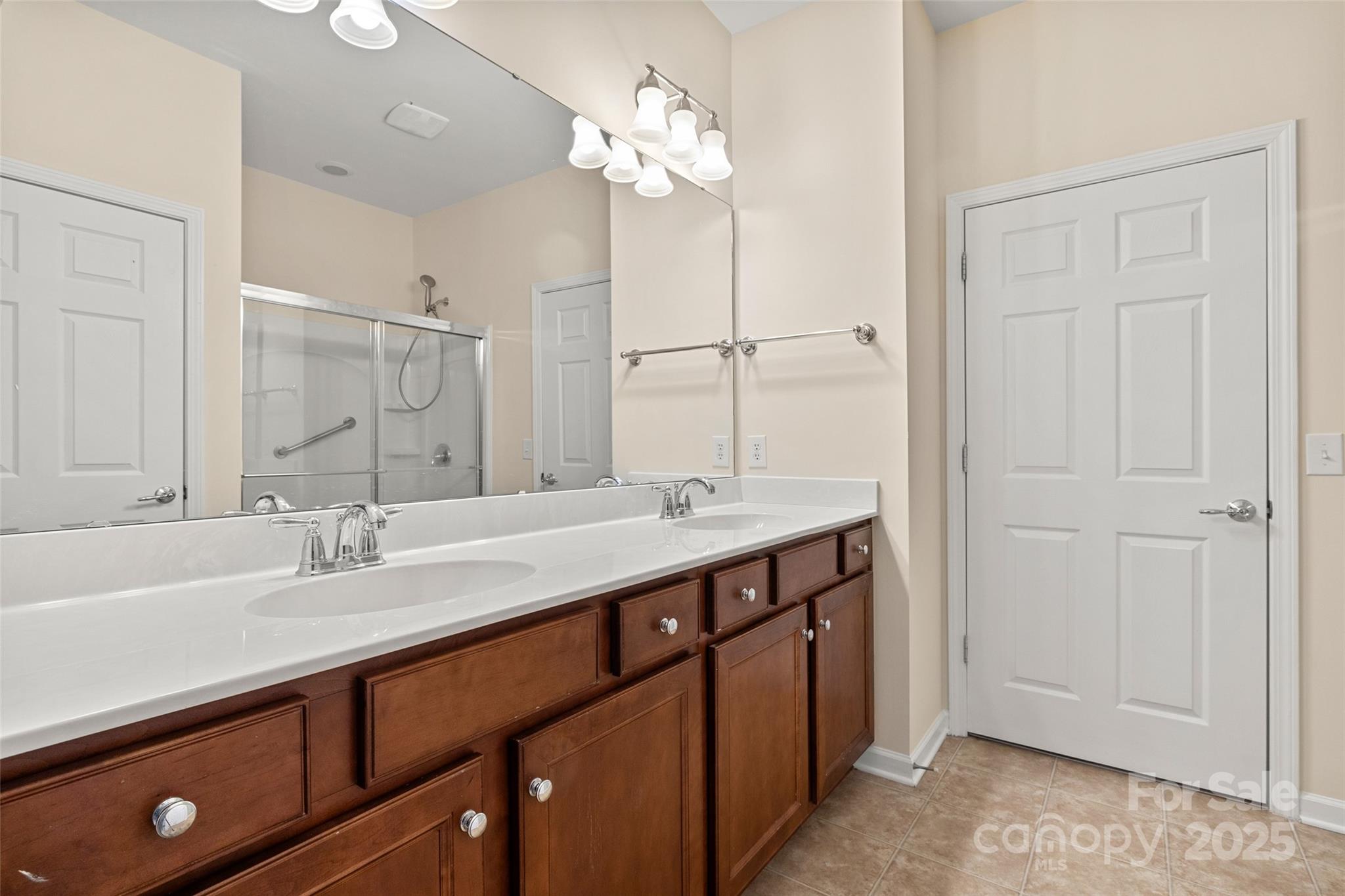 3012 Edisto Way Indian Land, SC 29707 - Photo 15 of 44 a bathroom with a sink double vanity and a mirror