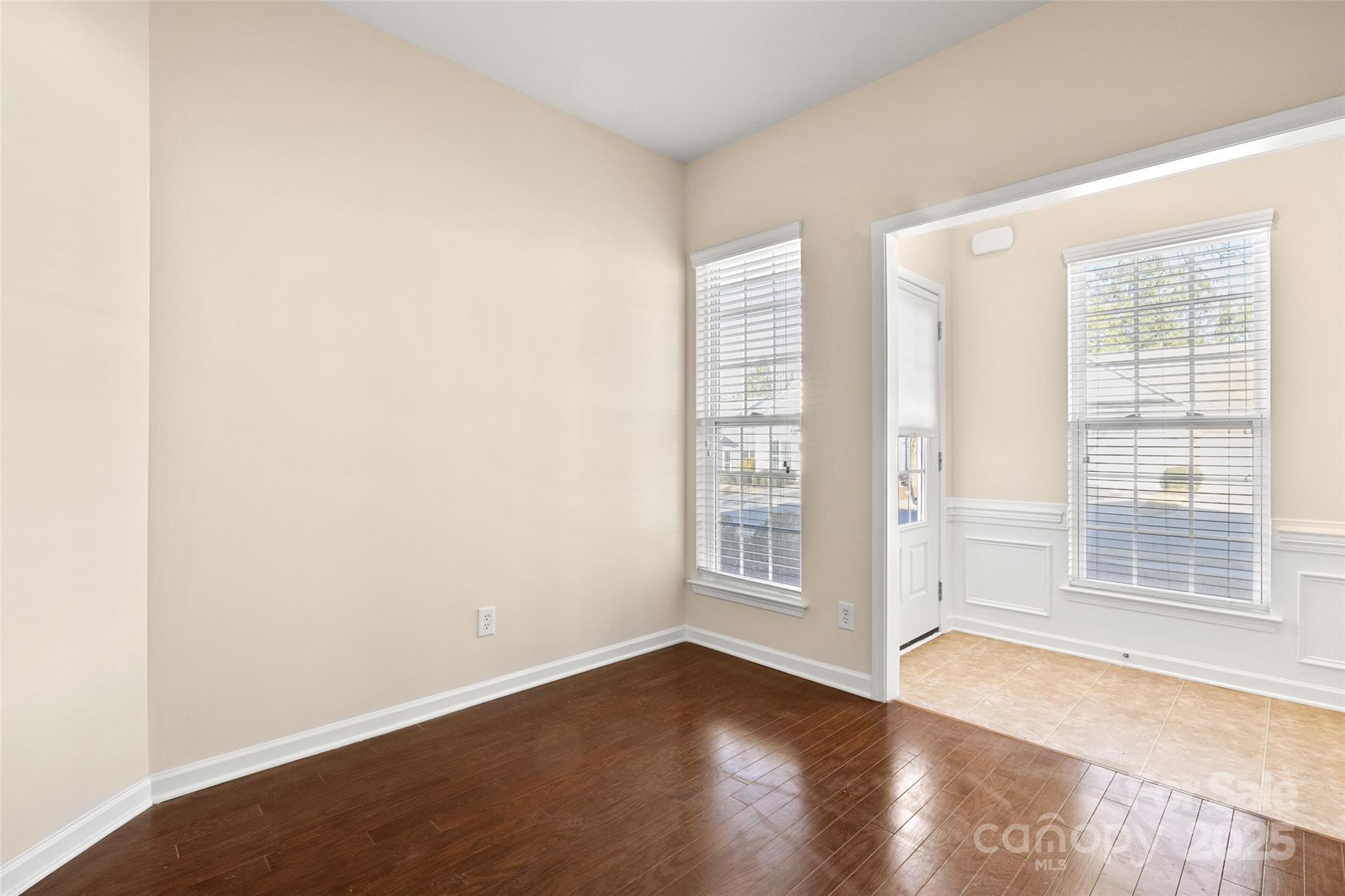 3012 Edisto Way Indian Land, SC 29707 - Photo 4 of 44 an empty room with wooden floor and windows
