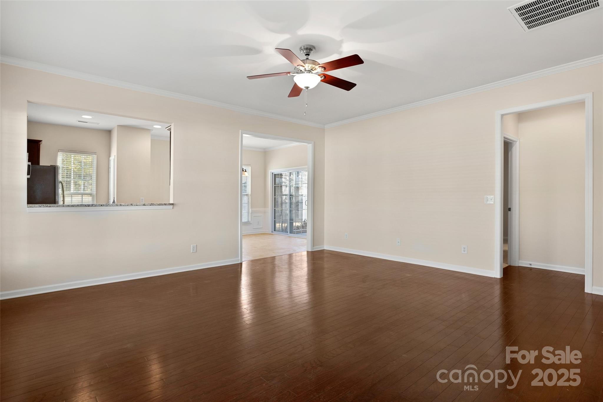 3012 Edisto Way Indian Land, SC 29707 - Photo 6 of 44 a view of an empty room with wooden floor
