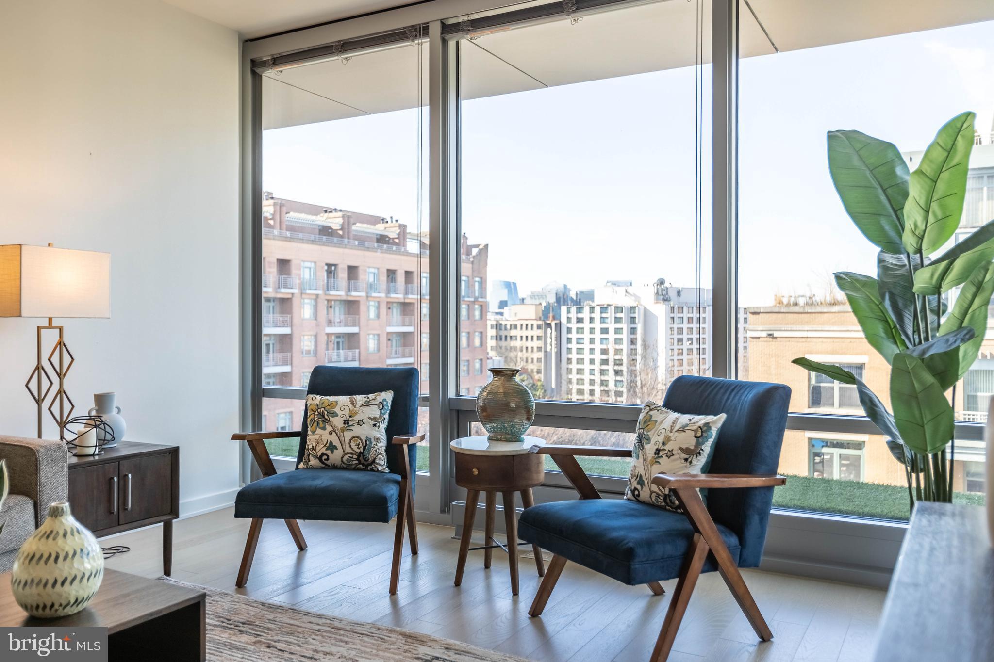 1111 24th Street Northwest, Unit 72 Washington, DC 20037 - Photo 11 of 20 Wall of floor to ceiling windows