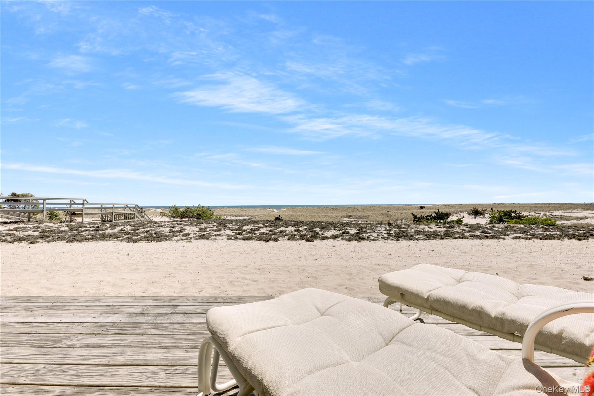 279 Dune Road, Unit 2 Westhampton Beach, NY 11978 - Photo 29 of 45 a view of a city and ocean view