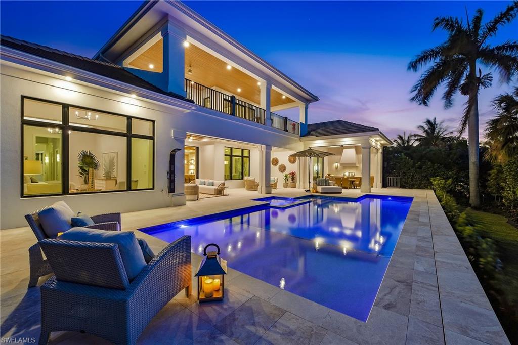 a view of a chairs and tables in the patio