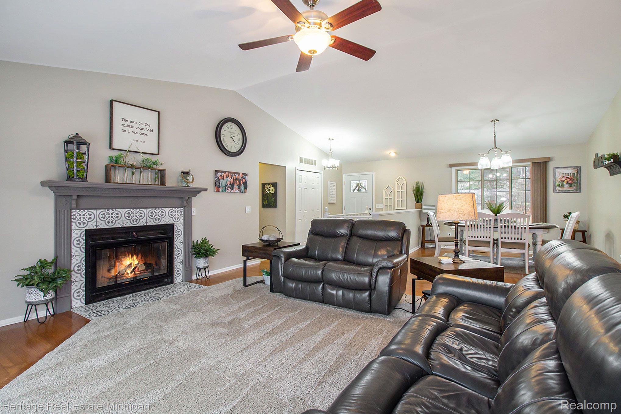 16505 South Seymour Road Linden, MI 48451 - Photo 9 of 33 The Living Room has a glorious fireplace to enjoy!
