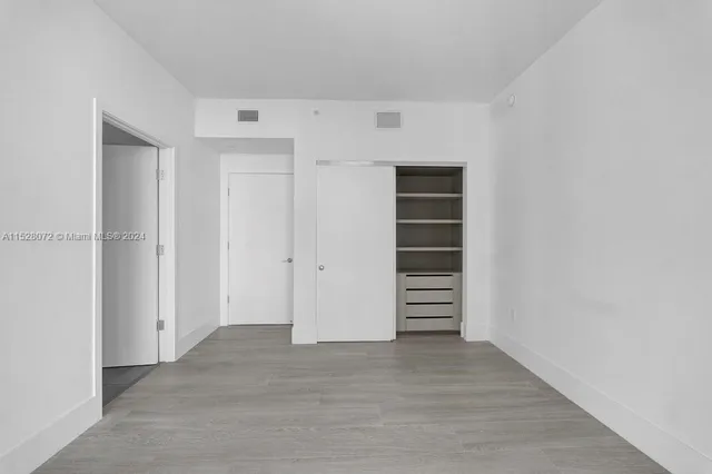 a view of walk in closet with stairs