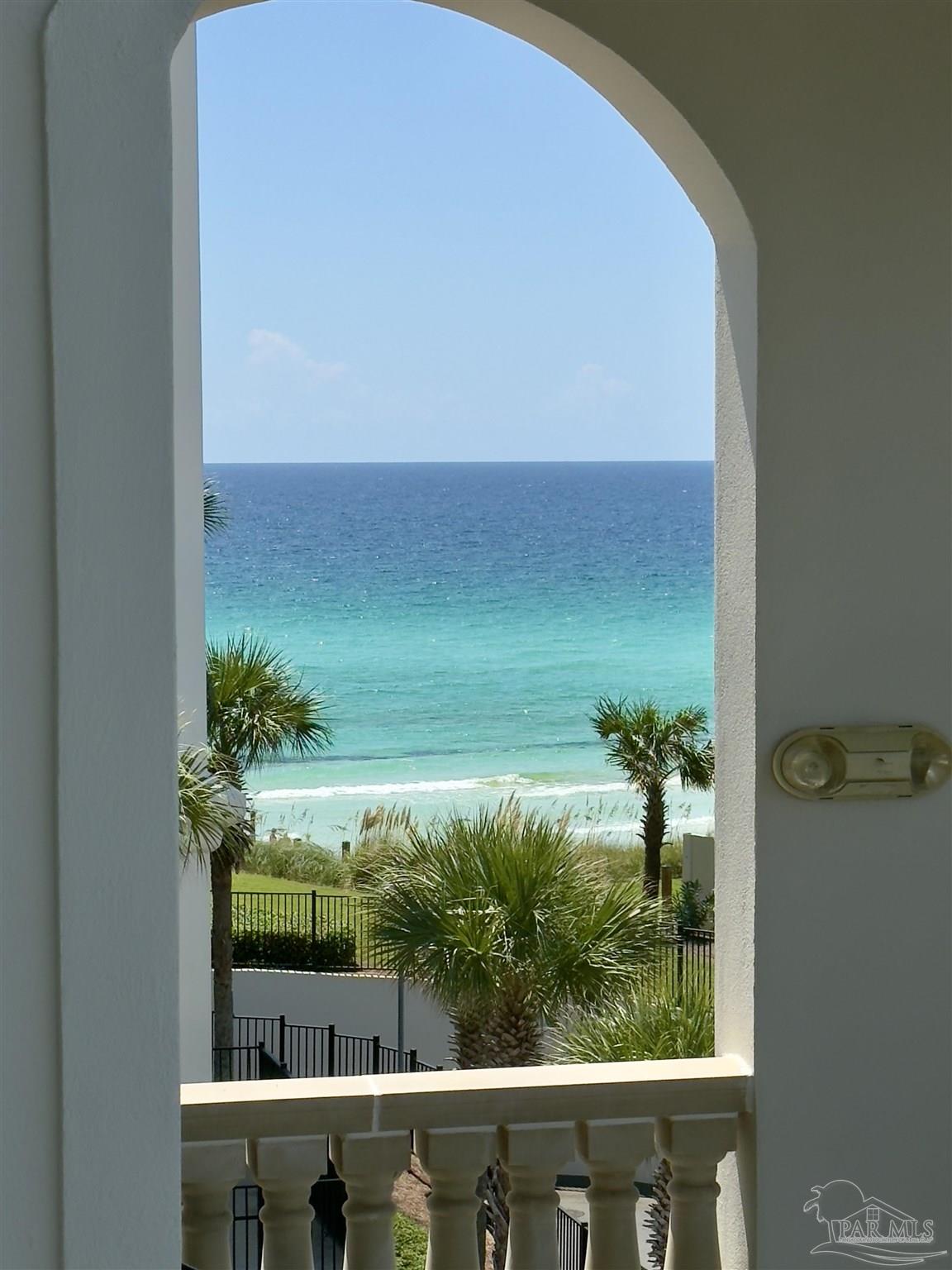 a view of a lake from a balcony