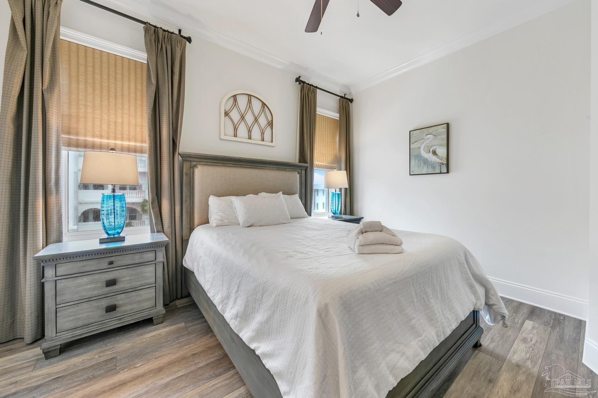 2421 West County Highway 30A, Unit G405 Santa Rosa Beach, FL 32459 - Photo 28 of 35 a bedroom with a bed and a window