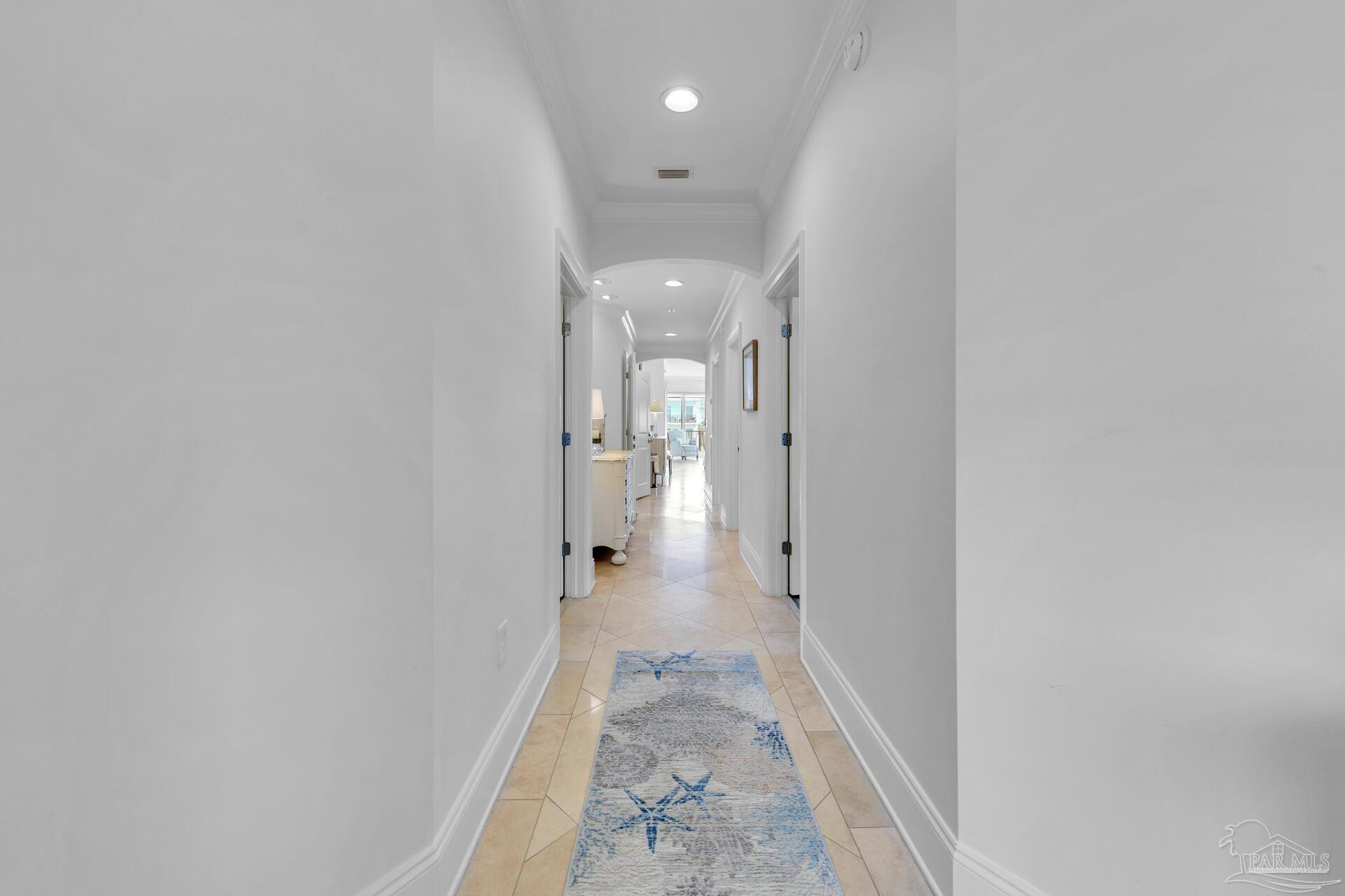 2421 West County Highway 30A, Unit G405 Santa Rosa Beach, FL 32459 - Photo 3 of 35 a view of a hallway with a white walls