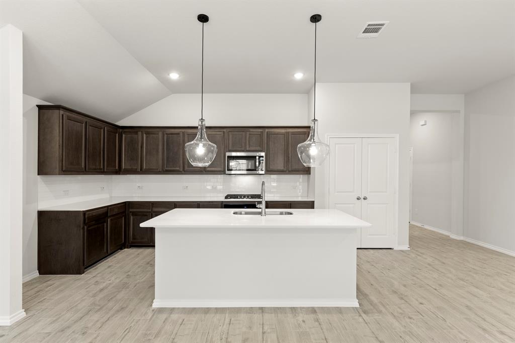 114 Bandit Trail Terrell, TX 75160 - Photo 3 of 27 07. 114 Bandit - Kitchen