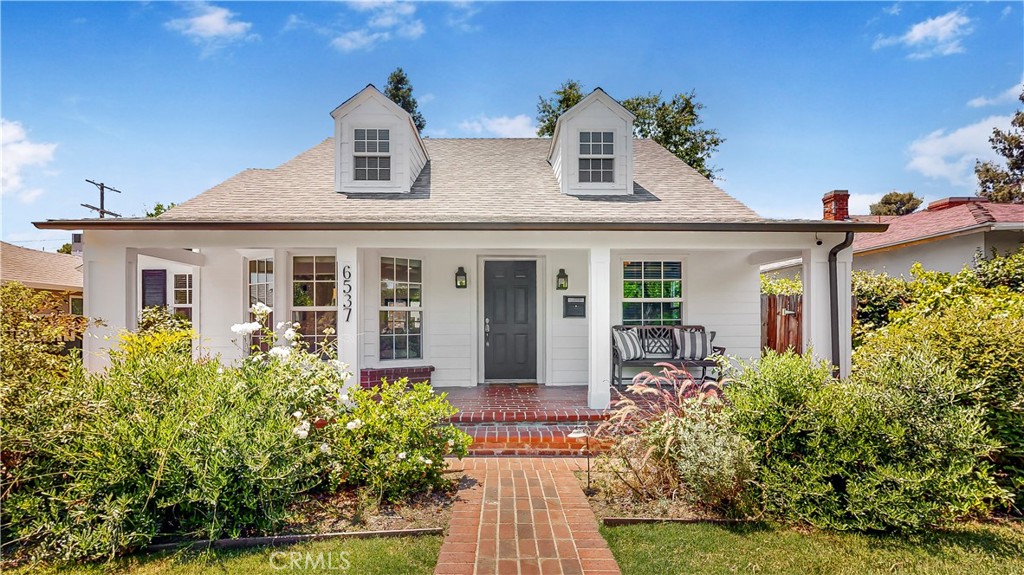 6537 Ranchito Avenue Valley Glen, CA 91401 - Photo 1 of 1 front view of a house with a yard