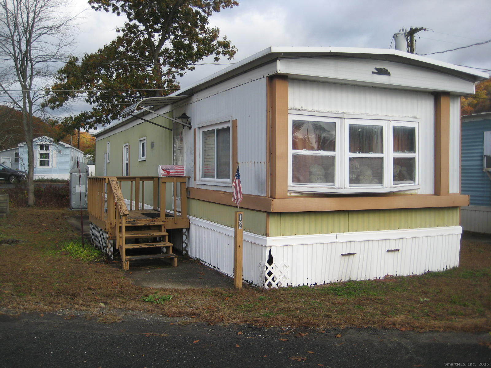 12 Susan Street Beacon Falls, CT 06403 - Photo 1 of 1 a front view of a house with a garden