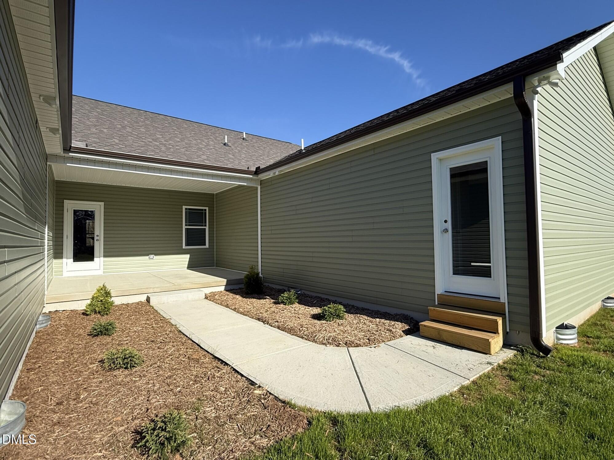 70 Hot Spgs Way Benson, NC 27504 - Photo 27 of 29 a view of house and yard