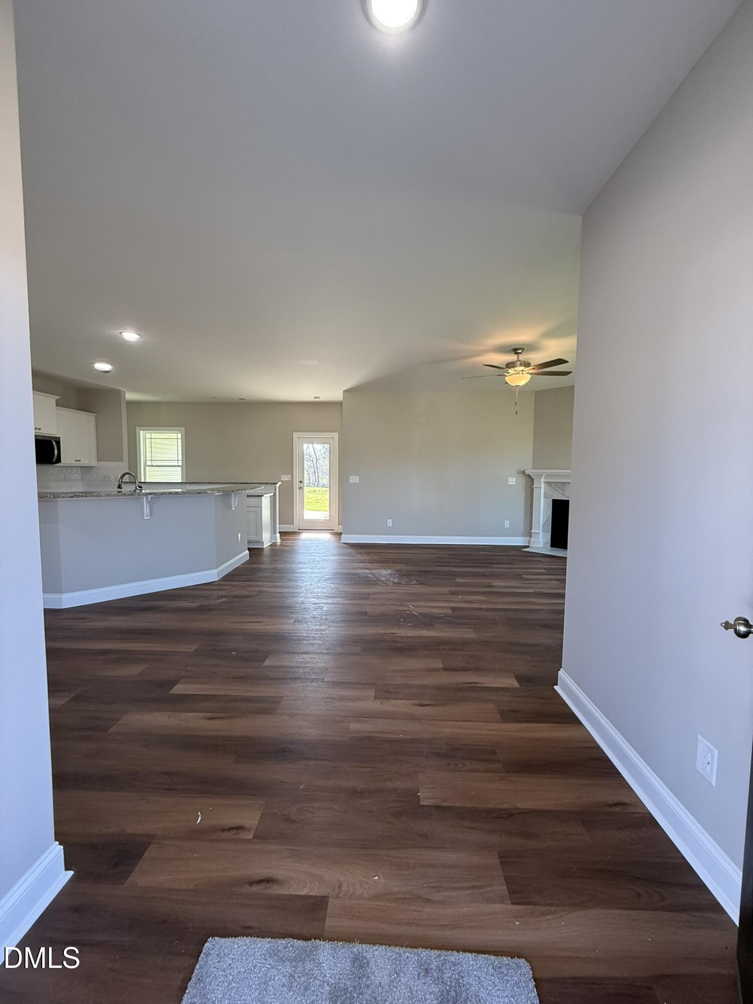 70 Hot Spgs Way Benson, NC 27504 - Photo 4 of 29 a view of entryway and hall with wooden floor