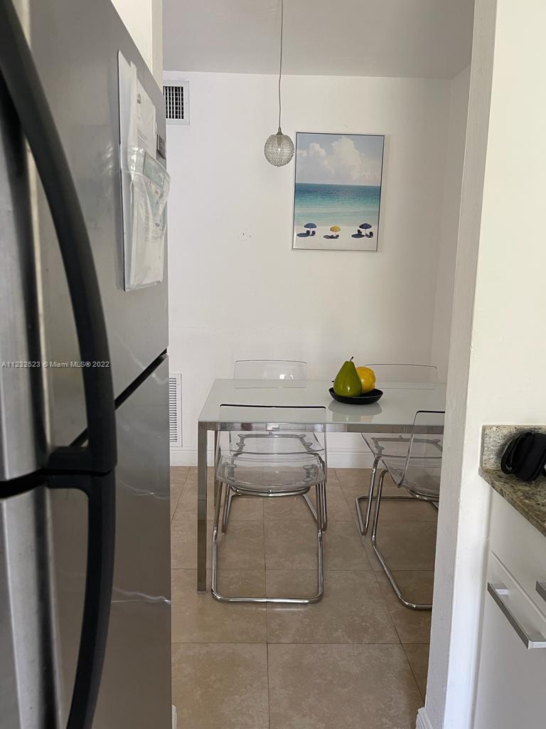 100 Sunrise Drive, Unit 25 Key Biscayne, FL 33149 - Photo 10 of 21 a bathroom with a sink and a shower