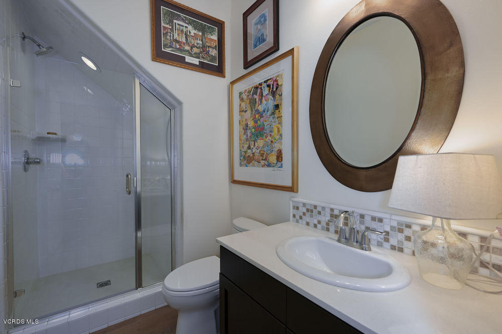372 Calistoga Road Camarillo, CA 93010 - Photo 13 of 36 a bathroom with a toilet a sink and a mirror