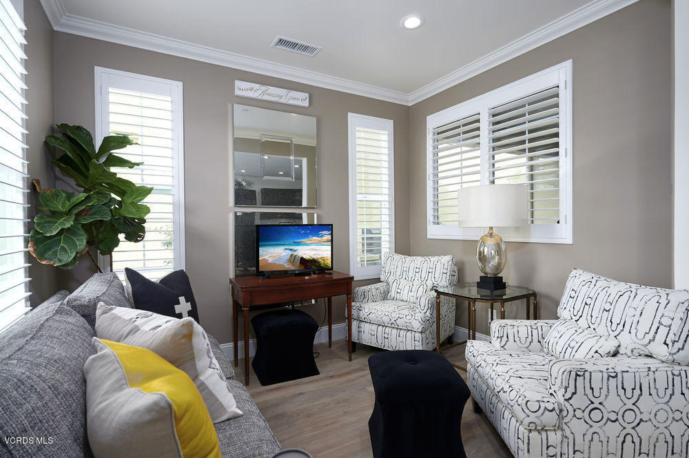 372 Calistoga Road Camarillo, CA 93010 - Photo 3 of 36 a living room with furniture fireplace and a potted plant