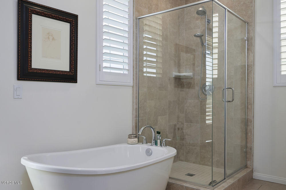 372 Calistoga Road Camarillo, CA 93010 - Photo 23 of 36 a bathroom with a bathtub and a shower