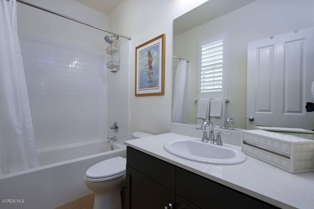 372 Calistoga Road Camarillo, CA 93010 - Photo 26 of 36 a bathroom with a granite countertop sink toilet and shower