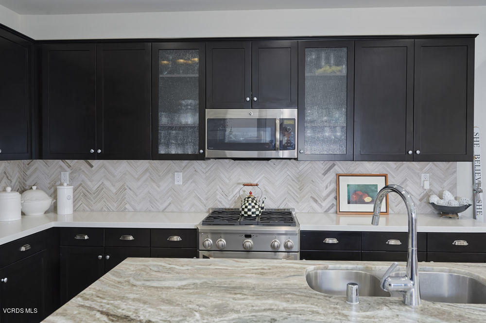 372 Calistoga Road Camarillo, CA 93010 - Photo 10 of 36 a kitchen with a sink and cabinets